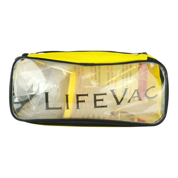 A yellow and black Medique LifeVac travel kit bag with a clear plastic bag inside with black text.