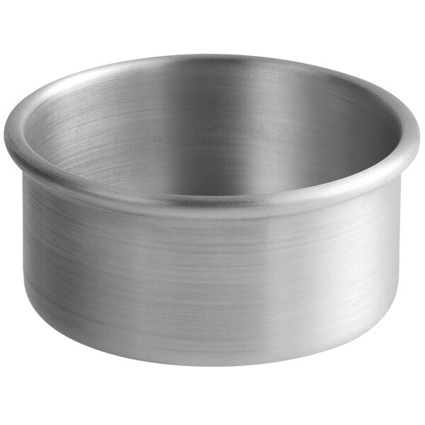 A close-up of a silver Choice mini round cake pan.