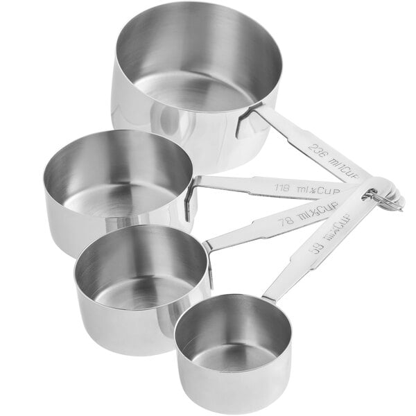 A set of four stainless steel measuring cups attached by a metal ring.