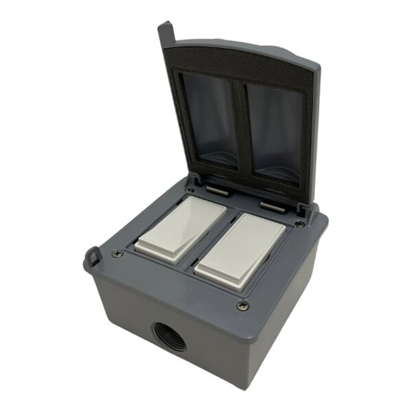A grey rectangular box with two white rectangular switches.