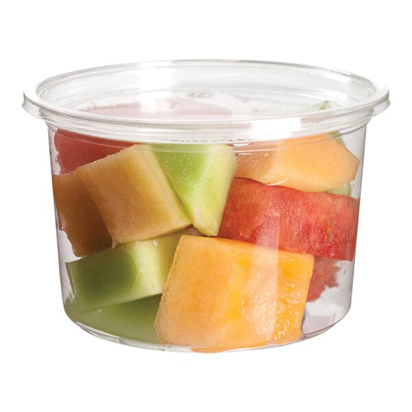 A Eco-Products compostable plastic deli container filled with a fruit salad.
