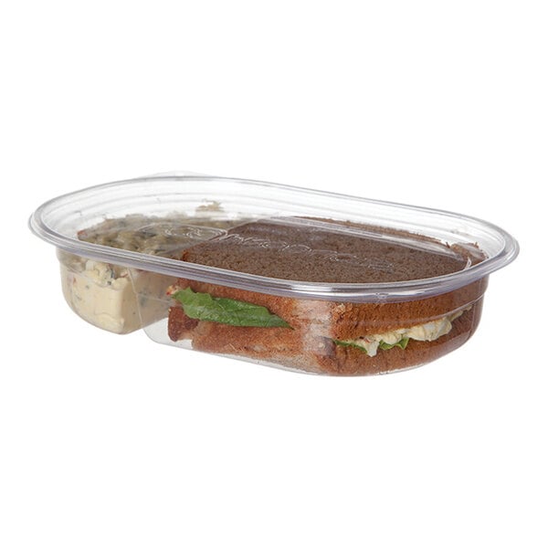 A sandwich and salad in an Eco-Products clear plastic deli container.