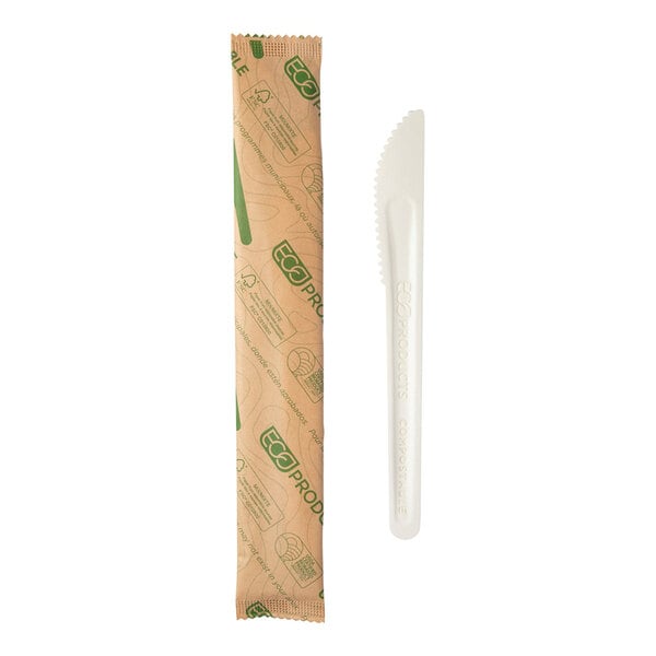 An Eco-Products white molded paper knife in a brown wrapper.