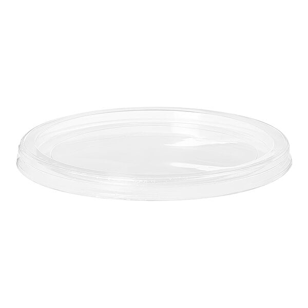 A clear plastic lid on a white surface.