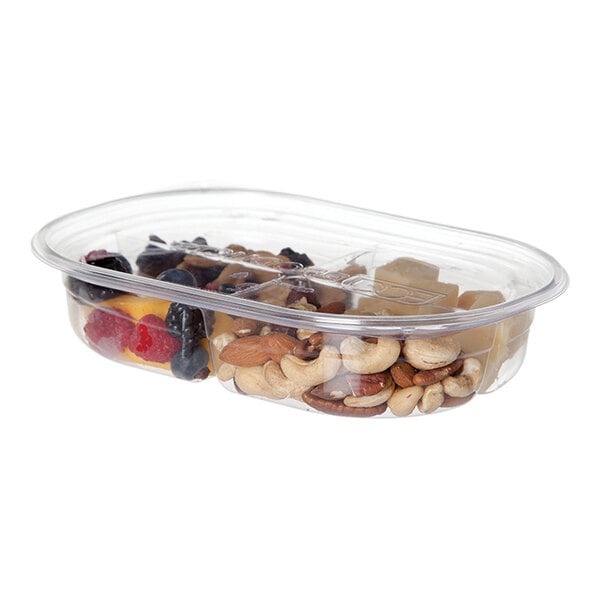 A clear plastic Eco-Products deli container with nuts and berries.