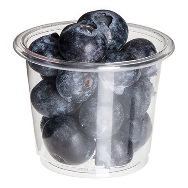 A plastic container of blueberries.