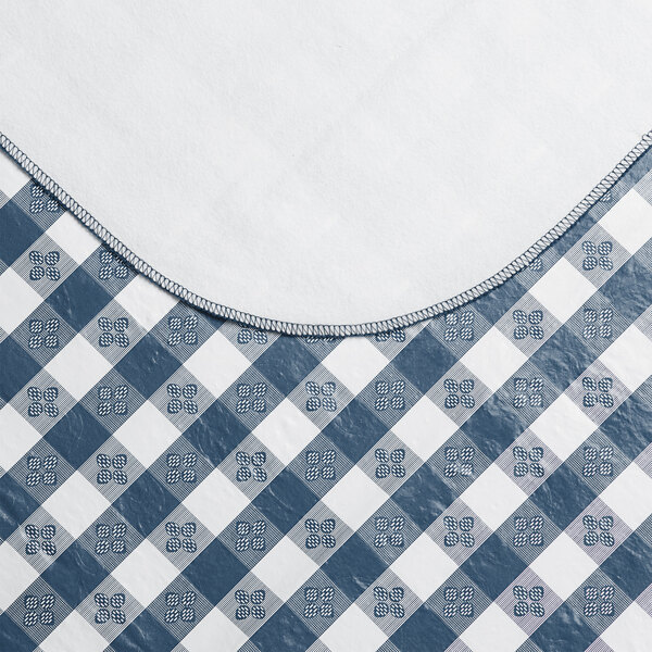 A navy and white gingham vinyl table cover with a flannel backing.