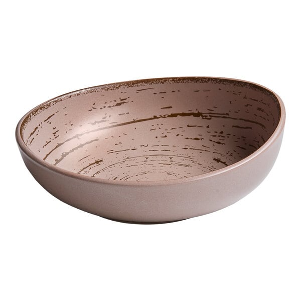 An Ariane Tornado porcelain bowl with a speckled surface and a brown and white pattern.