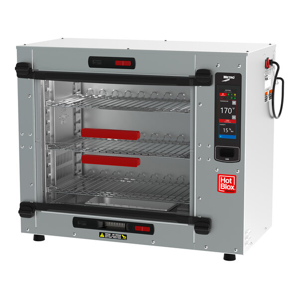 A silver Metro HotBlox Xpress countertop heated holding cabinet with shelves.