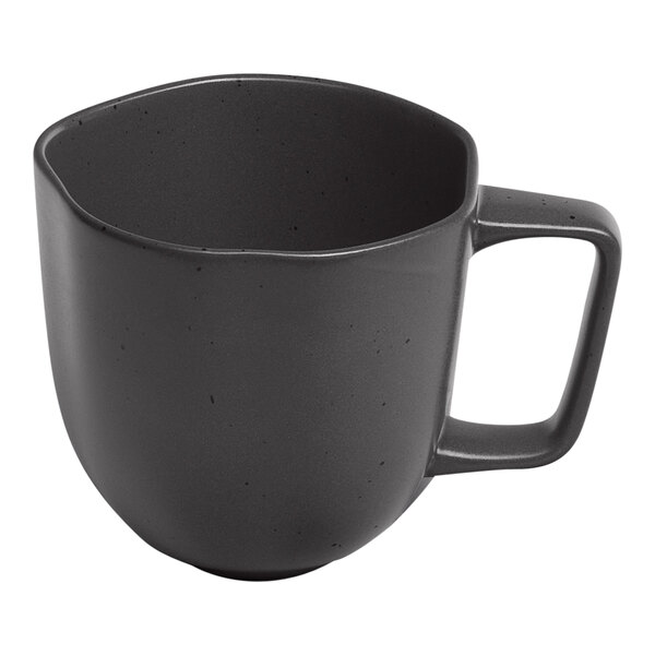 An Ariane charcoal grey porcelain mug with black dots and a handle.