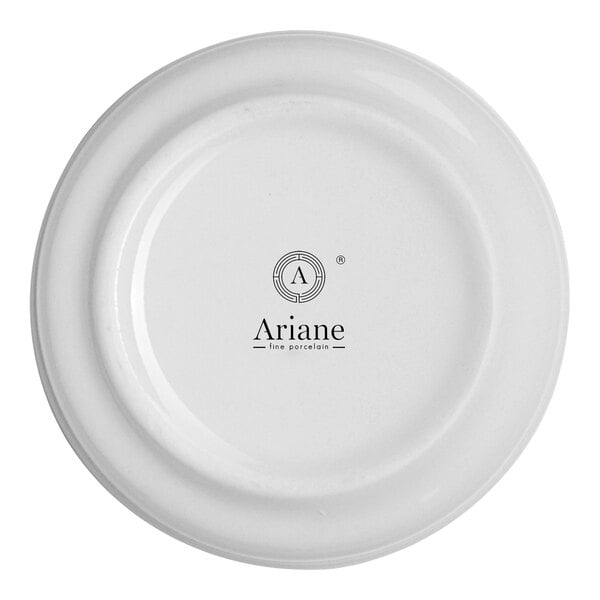 A round, white porcelain butter ramekin with the Ariane logo on the bottom.