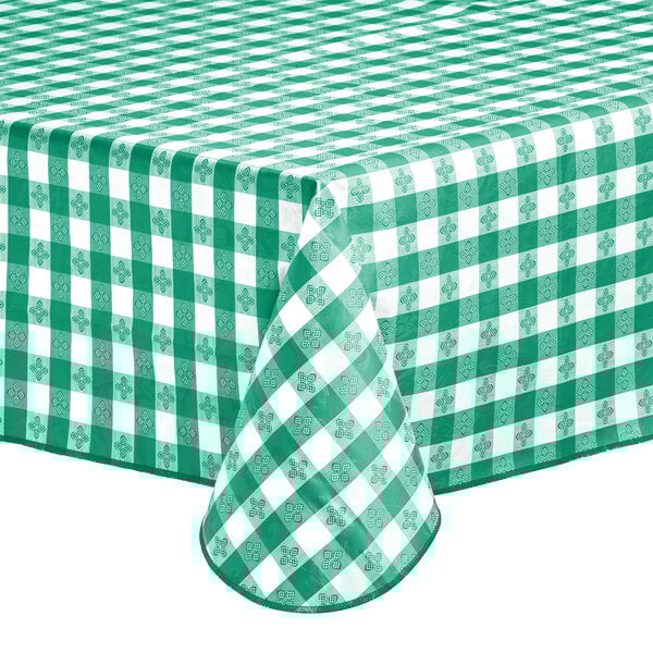 A green and white gingham-patterned vinyl table cover with a flannel back.