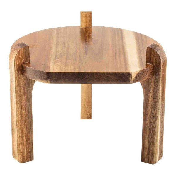 A wooden beverage dispenser stand made from acacia wood with a round top and three legs.
