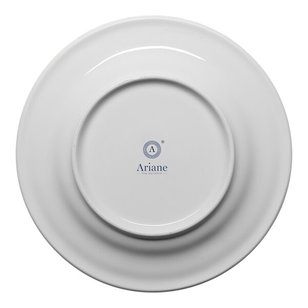 A round, warm white porcelain plate with a wide rim, shown from the bottom with the Ariane brand logo.