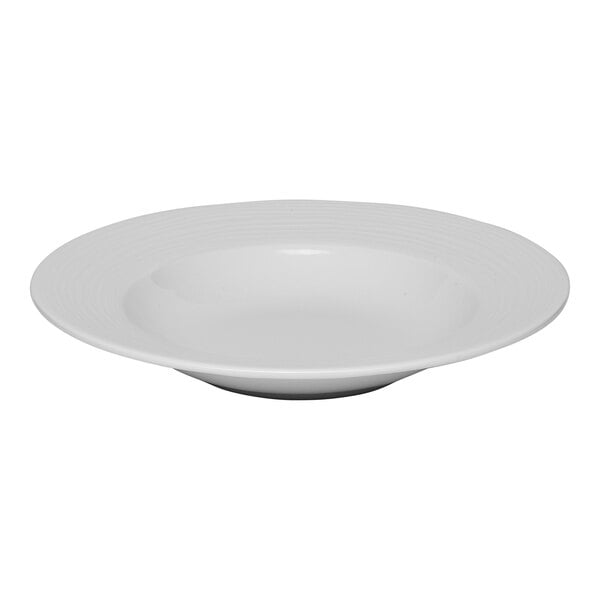 A white round porcelain plate with an embossed wide rim and deep center.