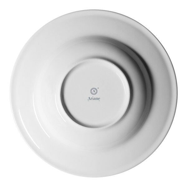 A white round porcelain plate with an embossed wide rim, viewed from above.