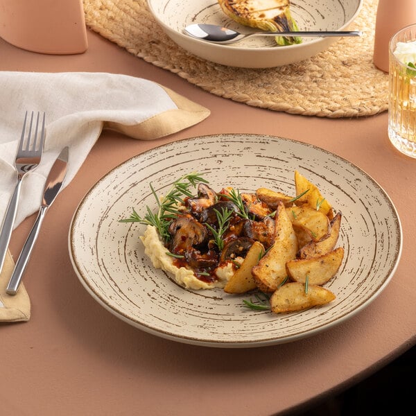 A round rimless porcelain plate with food on it.