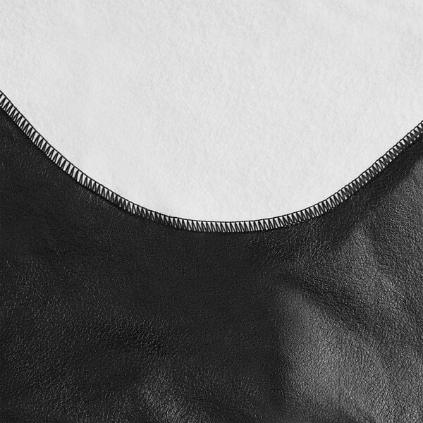 A black solid vinyl table cover with a flannel back.