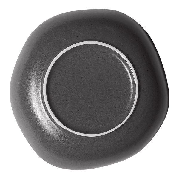 A charcoal grey porcelain plate with white dots on the rim.