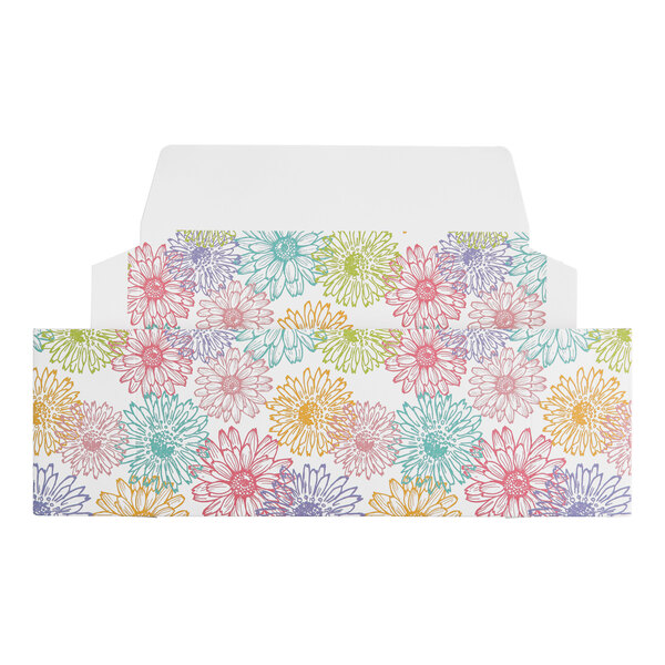 A rectangular candy box with a colorful spring floral pattern and an open lid.