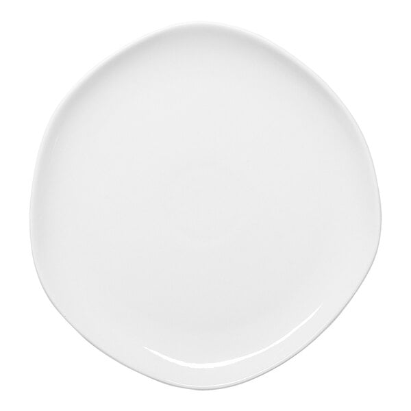 An Ariane Earth white porcelain plate with a round edge on a white surface.