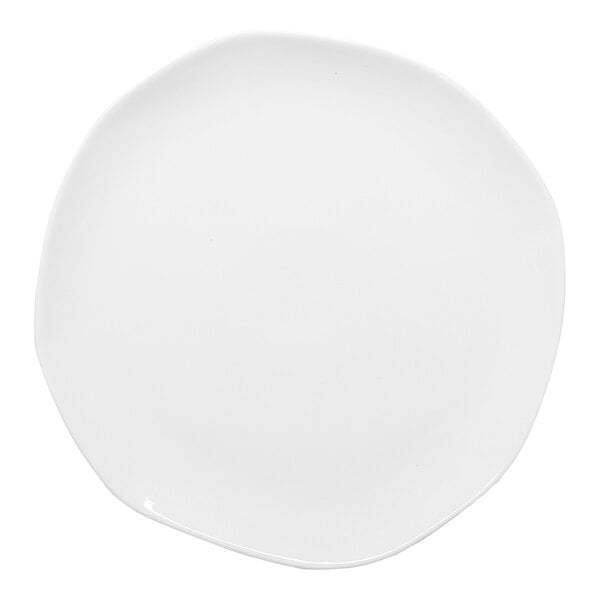 An Ariane Earth white porcelain plate with a curved edge.
