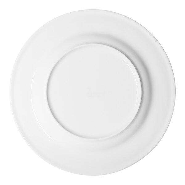 A round, wide-rimmed, warm white porcelain plate.