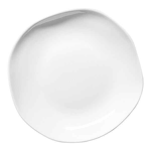 An Ariane Earth white porcelain plate with a curved edge.