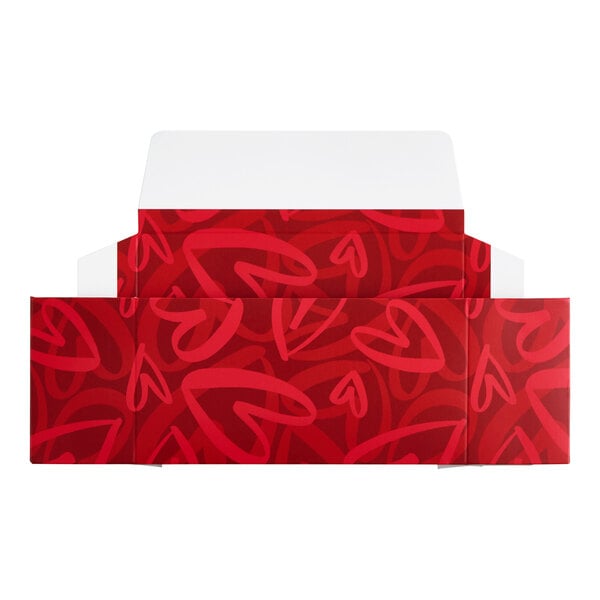 A flat, unfolded red candy box with a modern heart pattern design.