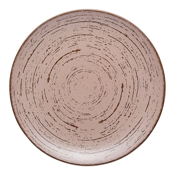 A close up of an Ariane Tornado dessert sage porcelain plate with a circular design.