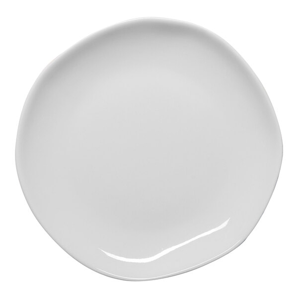 An Ariane Earth white porcelain plate with a curved edge.