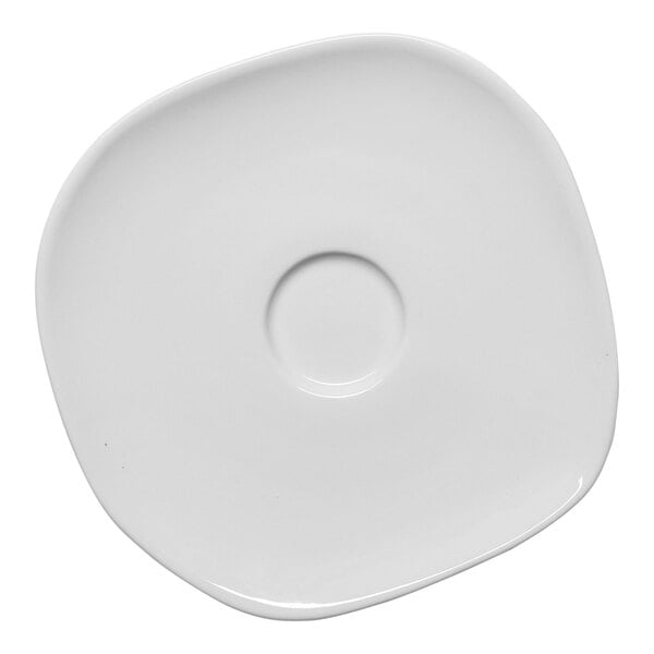 An Ariane Earth warm white porcelain saucer with a circular hole in the middle.