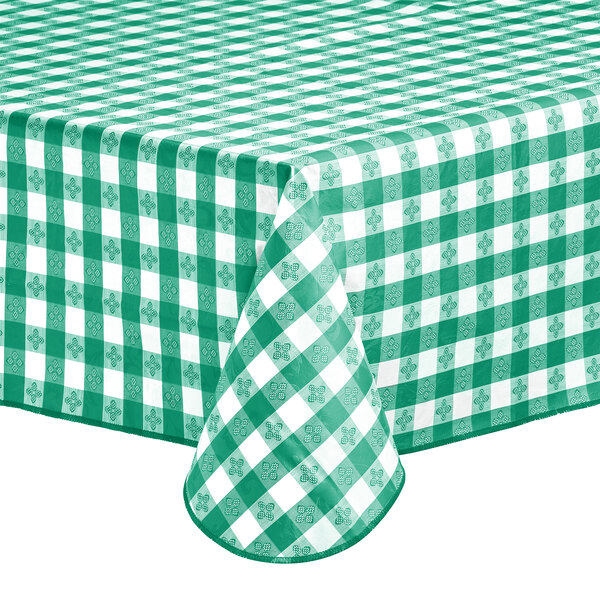 A green and white gingham vinyl table cover with a flannel back.