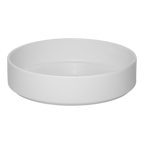 A round, warm white porcelain salad bowl with a smooth, stackable design.