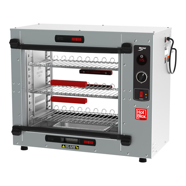 A silver Metro HotBlox countertop heated holding cabinet with shelves.