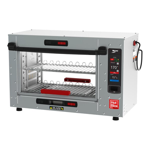A silver and black Metro HotBlox Xpress small countertop heated holding cabinet with a glass door.