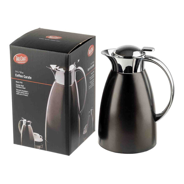A black stainless steel coffee carafe with a chrome handle and lid, shown next to its packaging box.