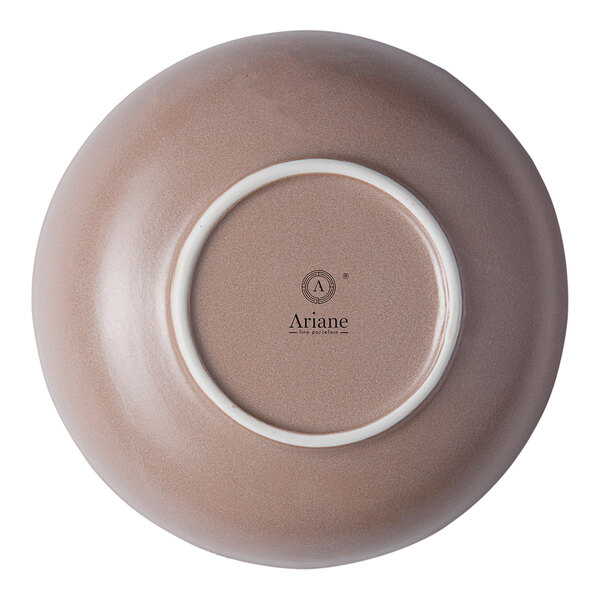 A white porcelain bowl with a brown and small rim.