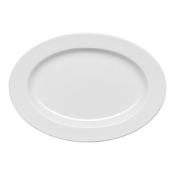 An oval white embossed wide rim platter.