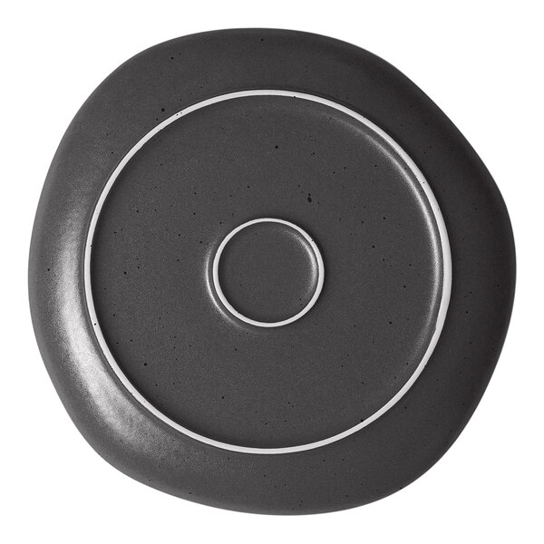 A charcoal grey porcelain plate with white dots in the middle.