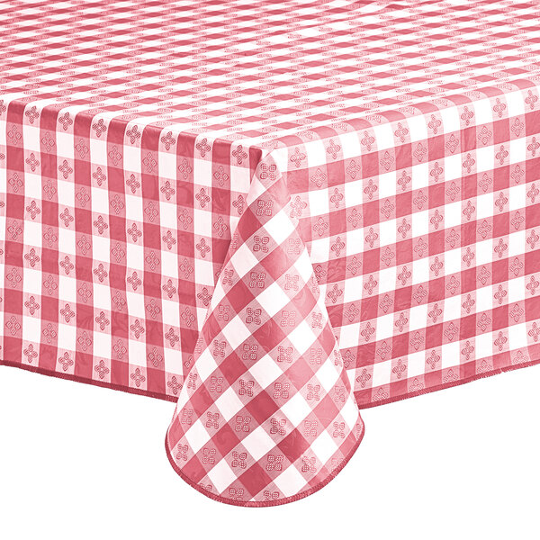 A rectangular burgundy and white gingham vinyl table cover with a flannel back.