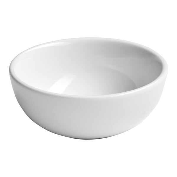 A round, warm white porcelain bowl with a smooth finish.