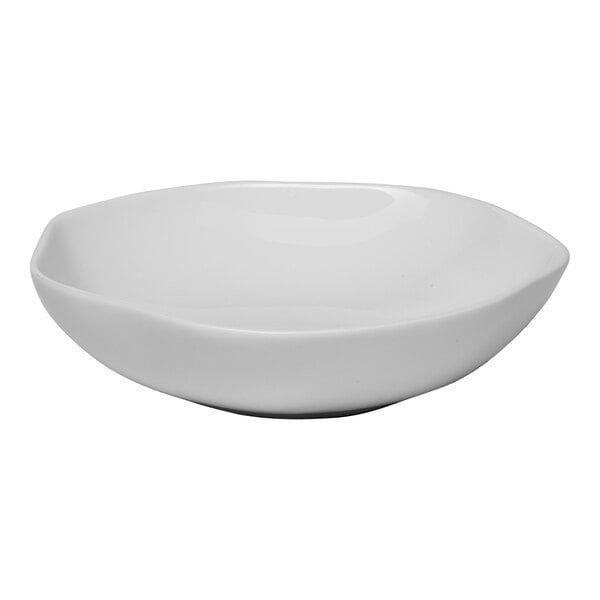 An Ariane warm white porcelain bowl with a curved edge.