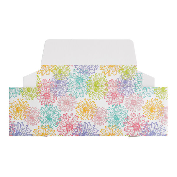A rectangular spring-themed candy box with a colorful floral pattern and an open flap.