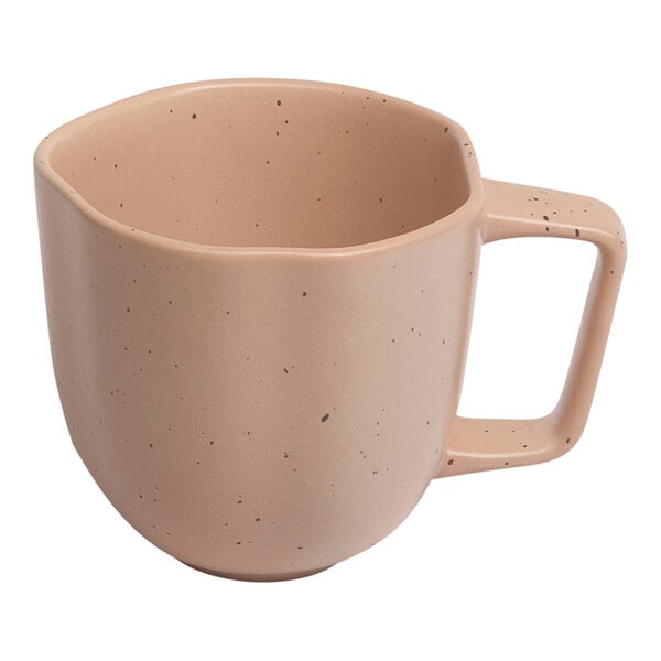 An Ariane dark sand porcelain cup with speckled dots.