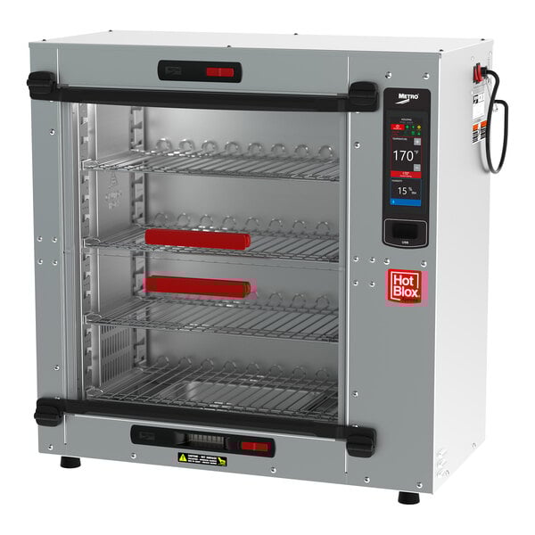 A large silver Metro HotBlox Xpress Countertop holding cabinet with shelves.