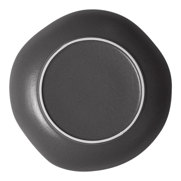 A charcoal grey porcelain plate with a white circle and silver rim.