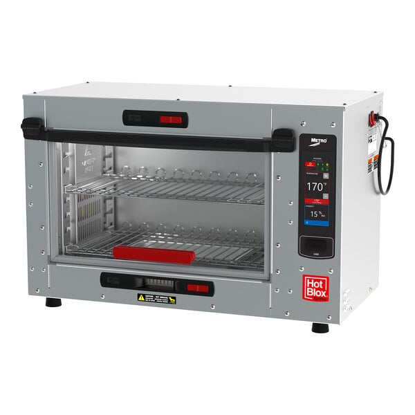 A silver Metro HotBlox countertop heated holding cabinet with a red handle on the door.
