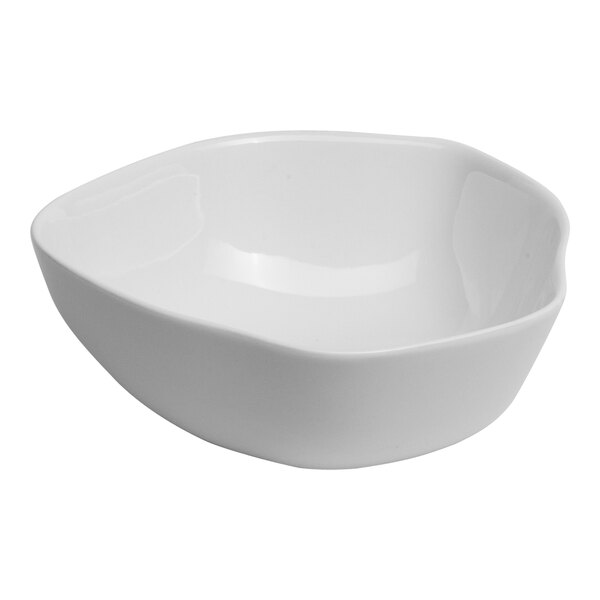 An Ariane warm white porcelain bowl with a curved edge.