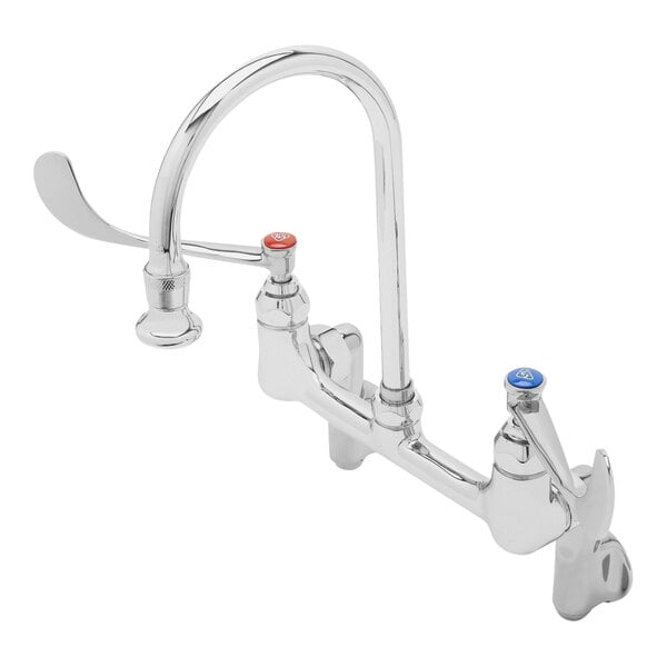 A T&S chrome wall mounted surgical sink faucet with two wrist action handles.